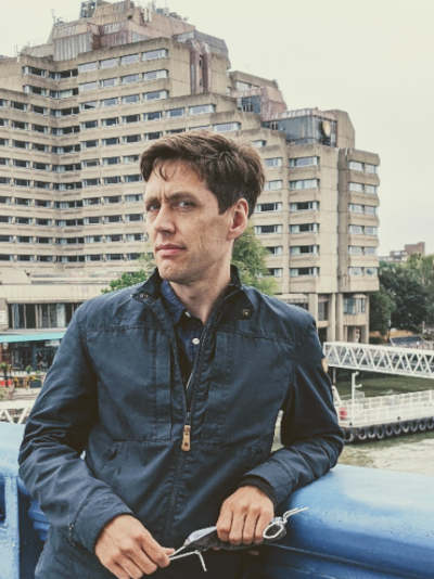 Julius Wilm standing on the Tower Bridge in London